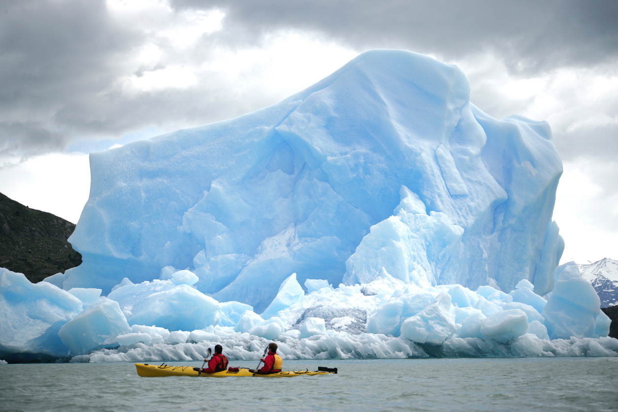Tandem kayaking in "Lago Gray". Next to Gray Glacier in chilean patagonia