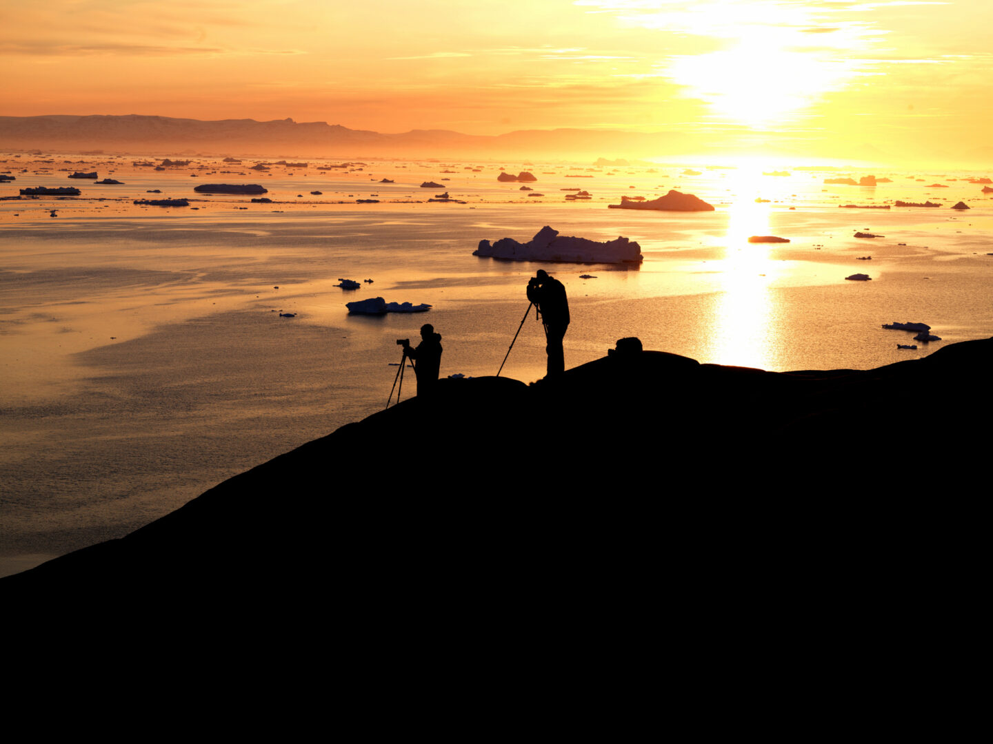 Sunset time to ice fjord of Greenland
