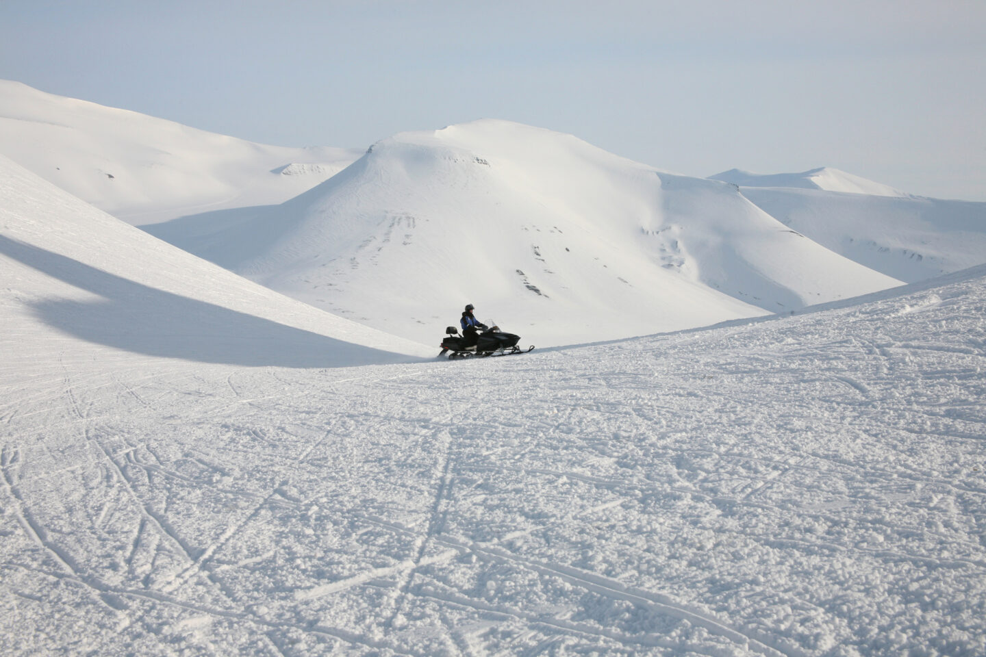 Snowmobile in the mountains of Svalbard, Norway