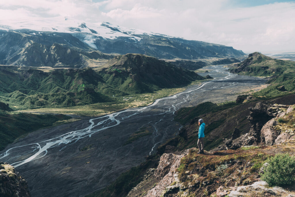 Scenic view of woman looking at Thórsmörk river valley