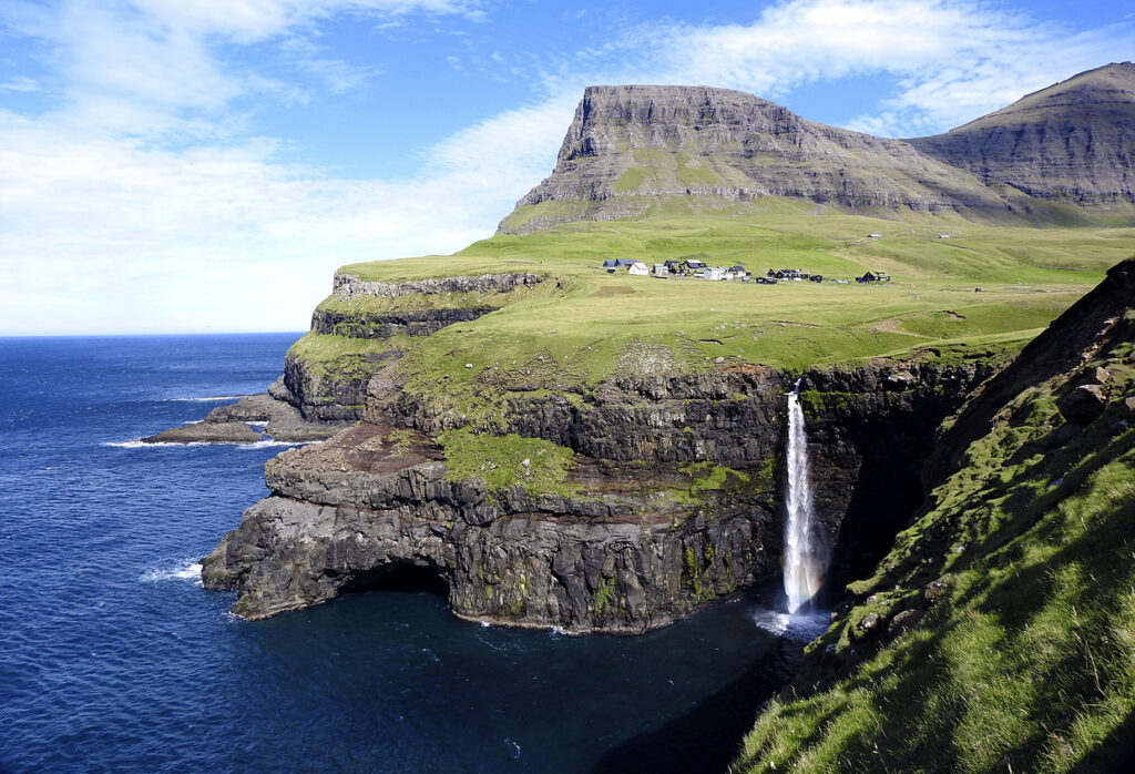 Gásadalur Waterfall on the island of Vaga in the Faroer Islands