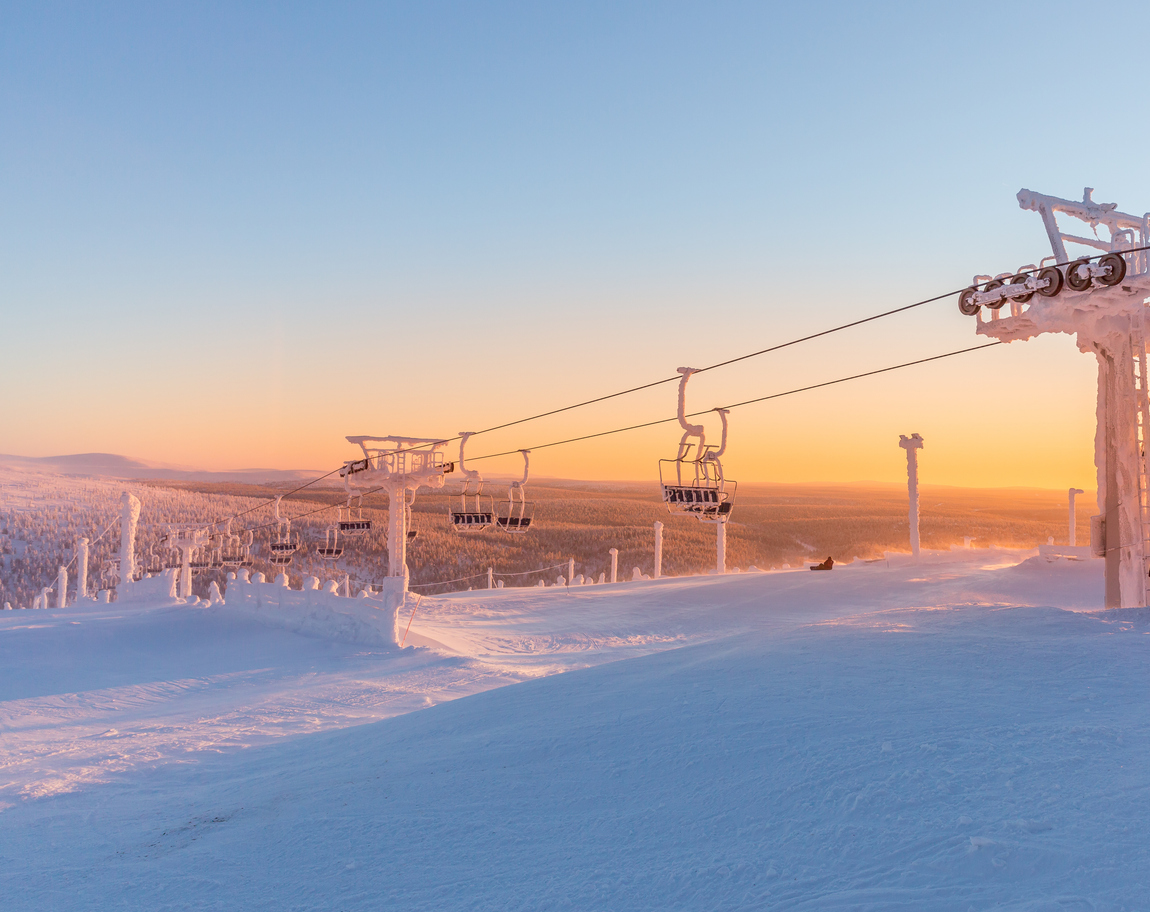 Winter mountains panorama with ski slopes and ski lifts