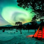 Barraca de acampamento sob a Aurora Boreal – Abisko – Suécia